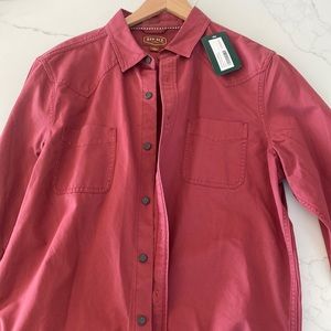 Red Ale red long sleeved shirt.